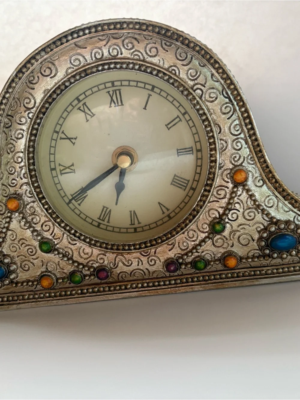 Ornate Silver-Tone Mantel Clock with Multicolor Accents